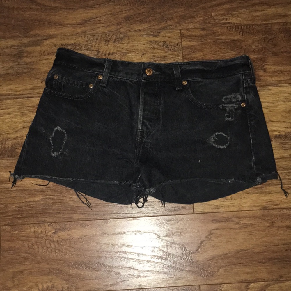 Black distressed Levi denim shorts